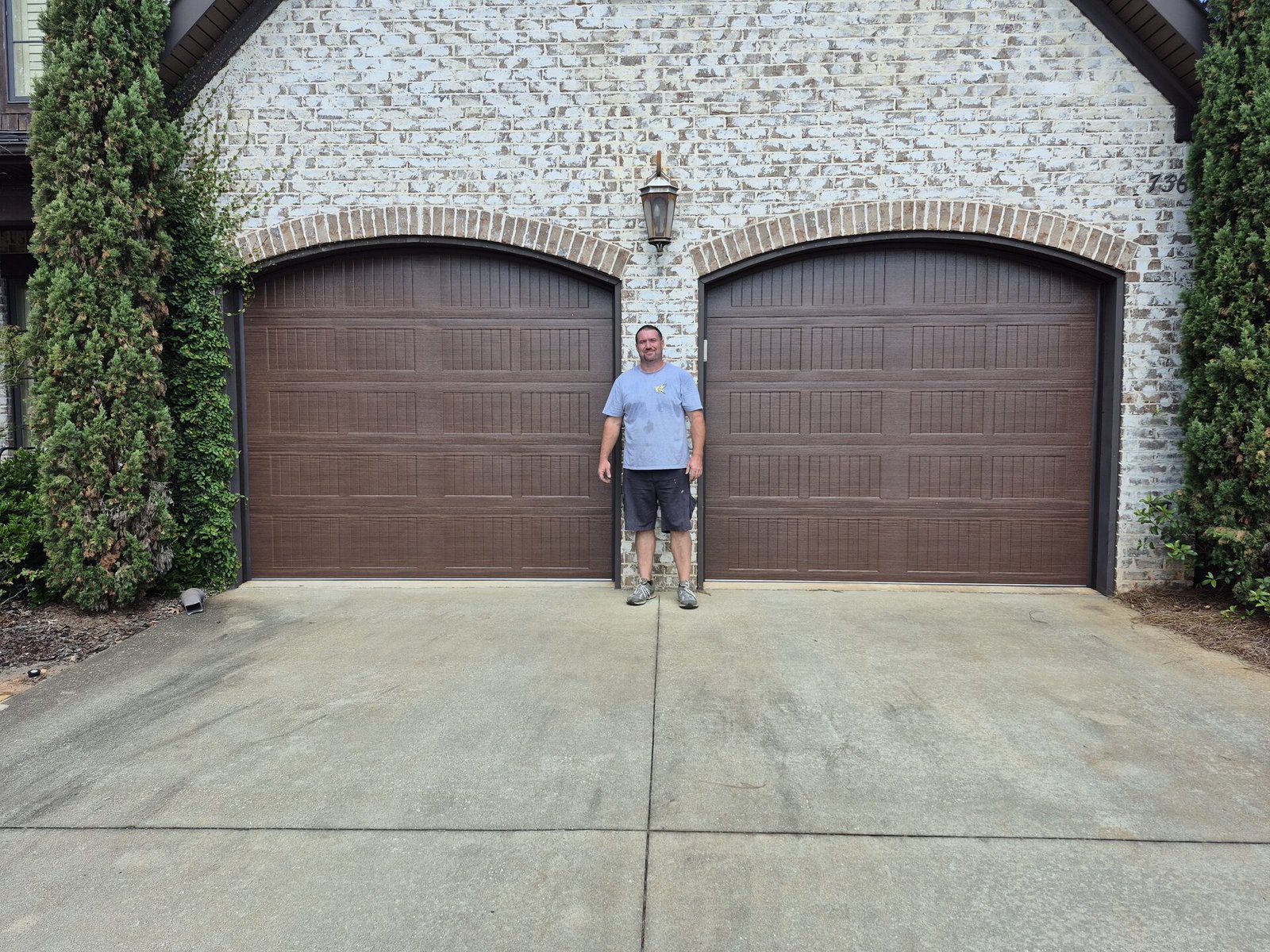 Custom arched garage doors installed in Auburn AL