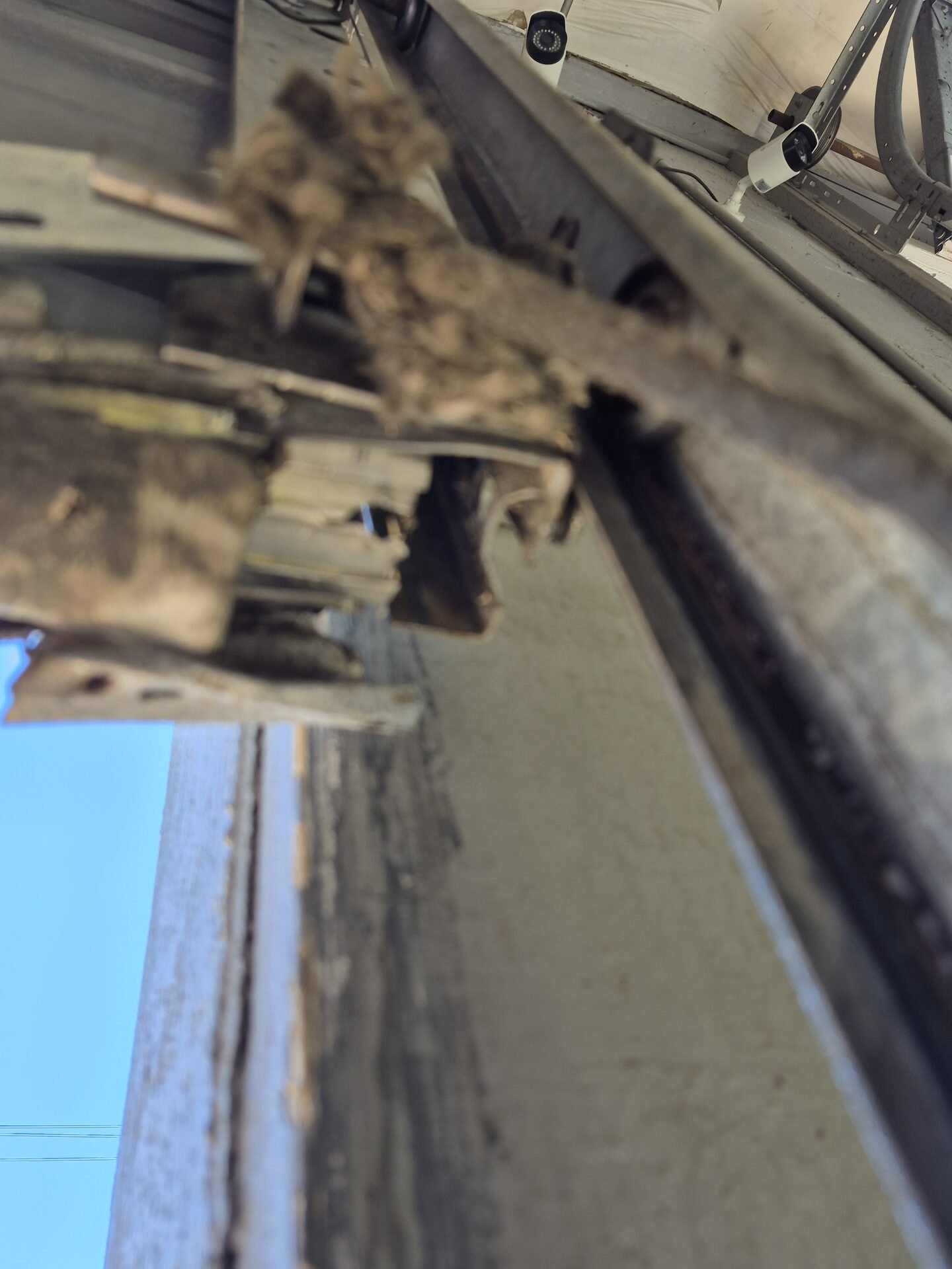 Damaged garage door frame needing repair